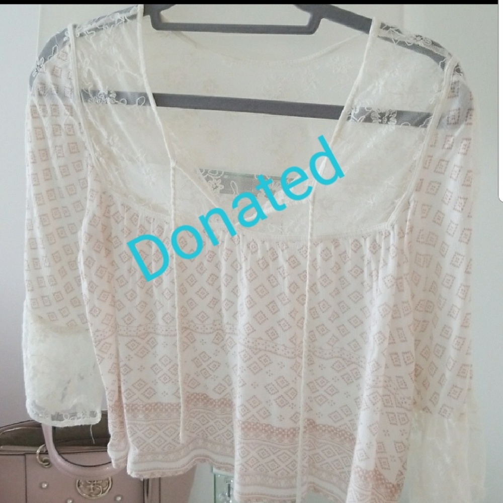 Donated blush blouse. Donated